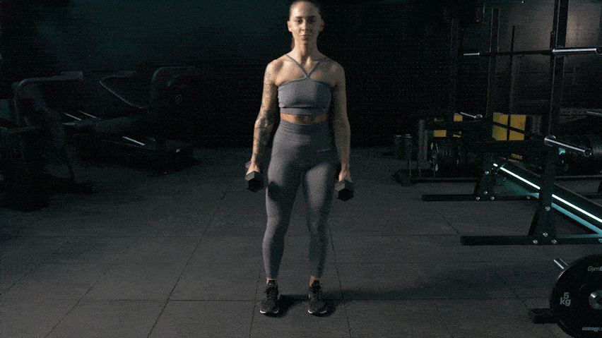 Σταυρωτές προβολές με αλτήρες (Dumbbells Curtsy Lunge)